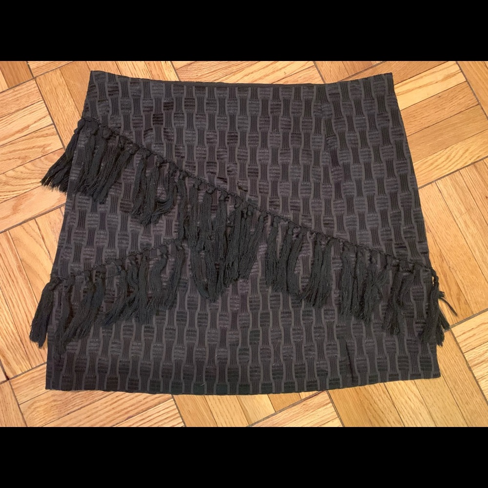 Cool black textured mini skirt with fringe detail
